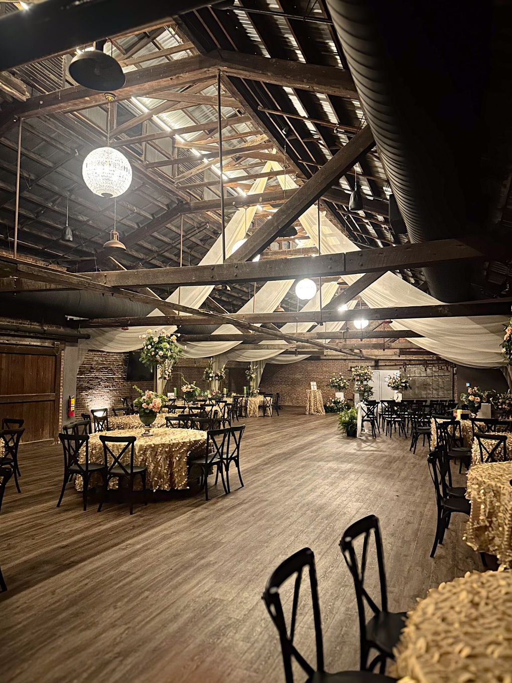The Hall set for a private event with draped ceiling and globe lights