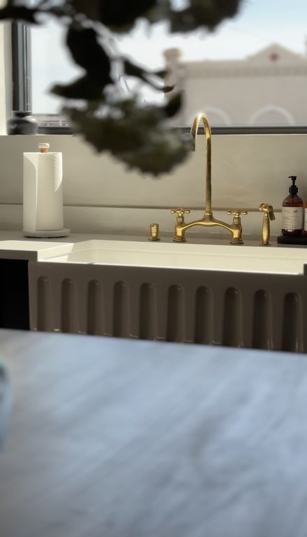 Kitchen sink beneath a window